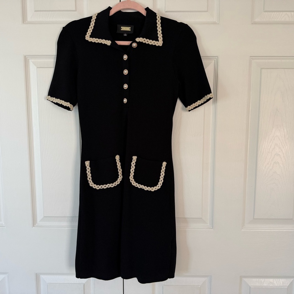 Elegant Black Dress with White Accents